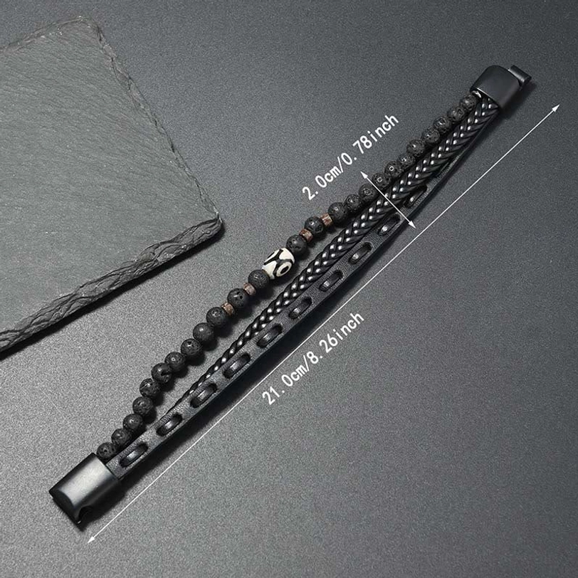 Tibetan nine-eye Dzi bead lava rock bracelet with size measurement 21cm 8.26 inches shown with slate reference