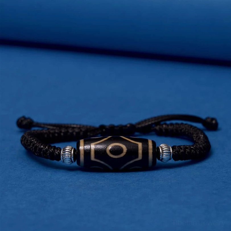 Tibetan dzi bead bracelet meditation and mindfulness tool for chakra alignment and energy balance