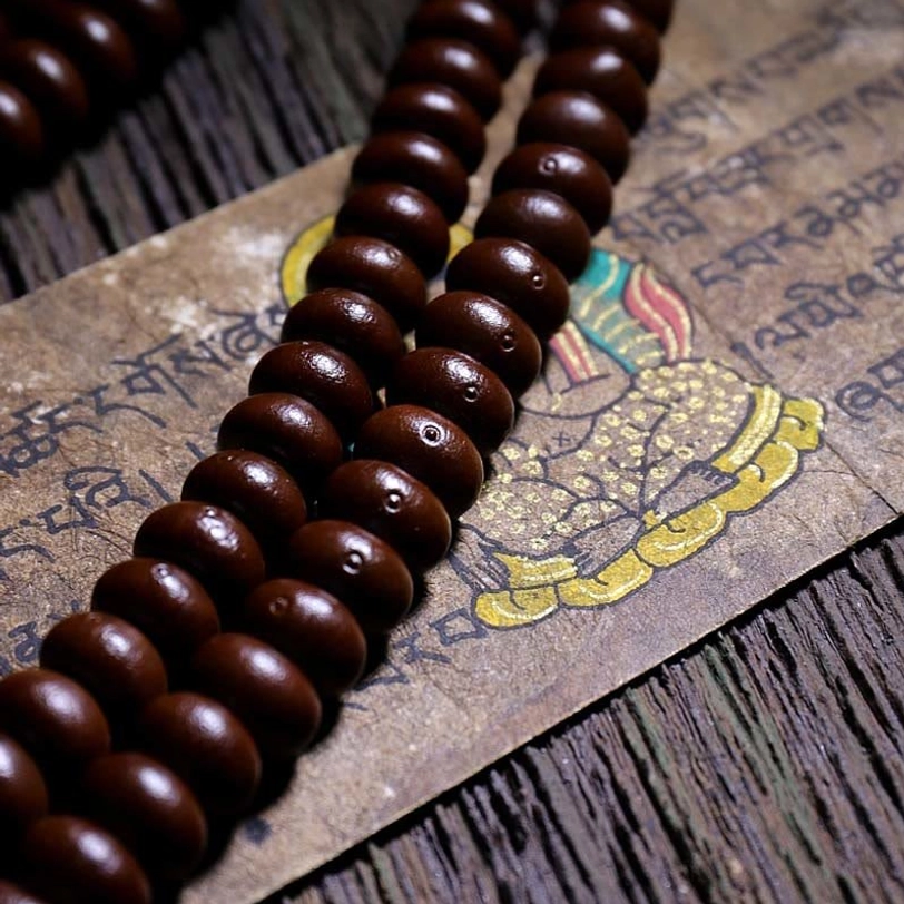 Tibetan mala bracelet with dzi bead and dorje charm for mindfulness and spiritual growth