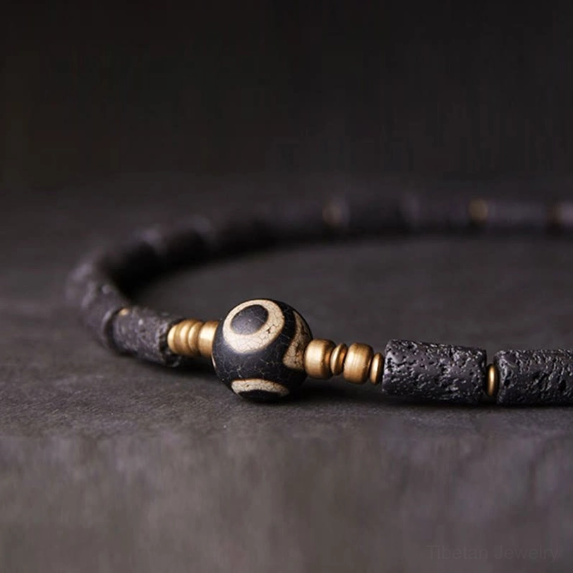 Three-eye dzi lava rock bracelet materials and specifications - natural lava rock six millimeter beads with brass accents