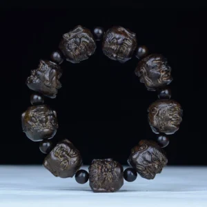 Ebony wood eighteen arhats carved wooden bracelet with hand-engraved arhat beads and spacer beads in dark brown finish