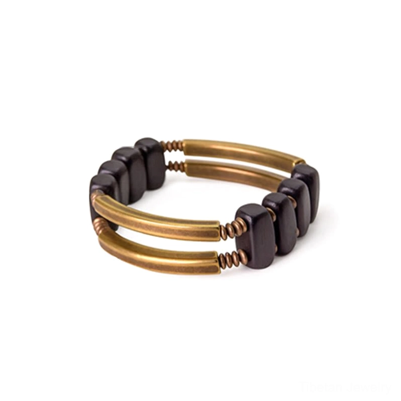Ebony wood brass bracelet care and maintenance instructions, displaying proper cleaning methods for natural materials and spiritual energy recharging