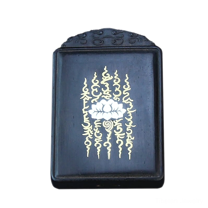 Front flat view of square ebony lotus pendant with carved decorative top and prominent inlaid lotus patterns