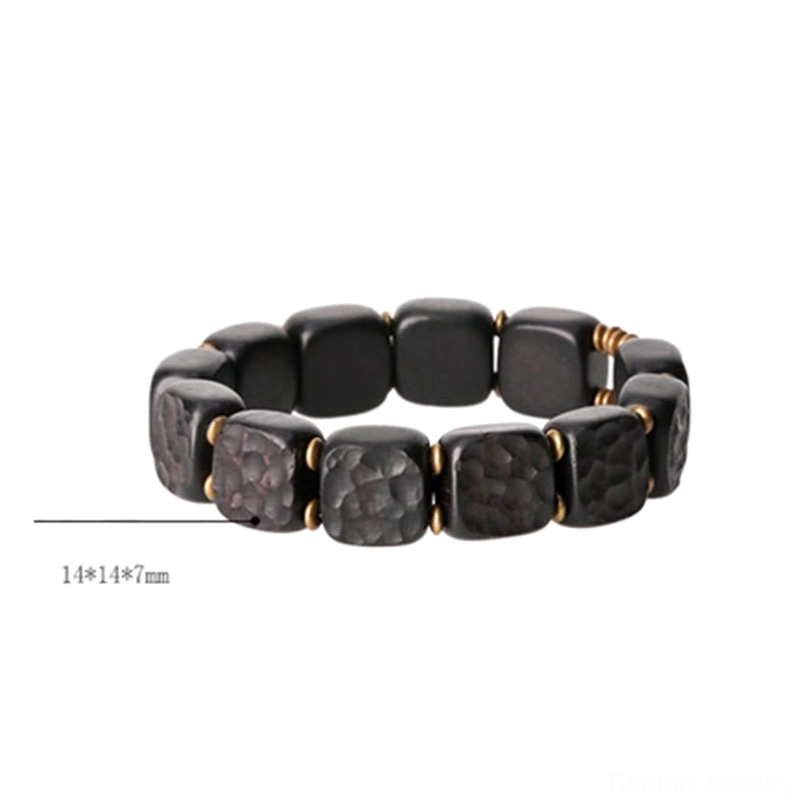 Product shot of ebony wood balance bracelet with size annotation 14x14x7mm showing square bead dimensions and gold components