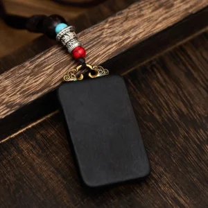 Plain ebony wood rectangular pendant on beaded necklace rope strap