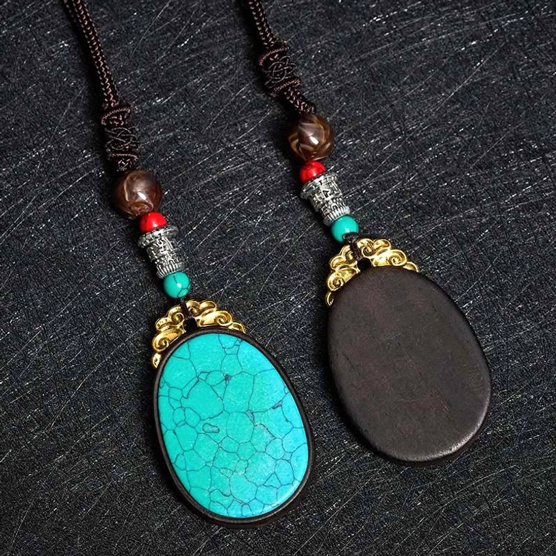 Ebony wood tribal oval necklace size comparison showing adjustable length and pendant dimensions