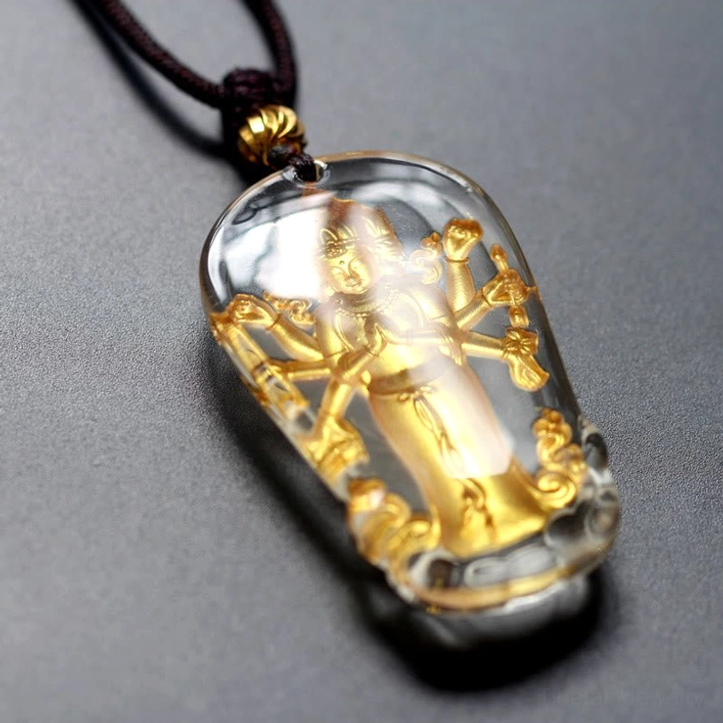 Oblique side perspective of Eight-armed Avalokitesvara Guanyin pendant highlighting crystal reflections and multi-armed Buddha design details