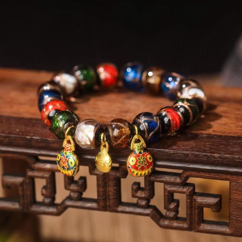 Five Elements Pixiu Family Charm bracelet featuring premium Liuli glass beads, incense ash accents, and handcrafted gold Pixiu family protection charm