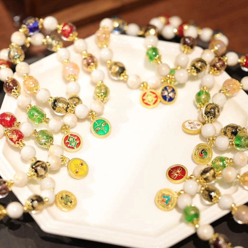 Five Gods of Wealth Tibetan bracelet lifestyle shot showcasing elastic string bracelet worn on wrist with detailed bead and charm visibility
