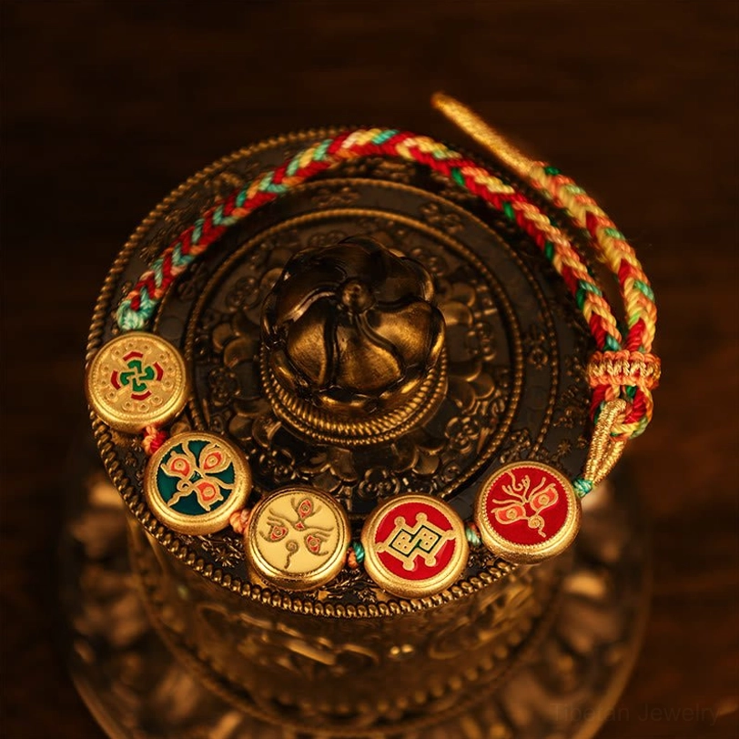 Five gods of wealth Tibetan bracelet premium quality showcase displaying handcrafted braided rope and cultural enamel deity medallions