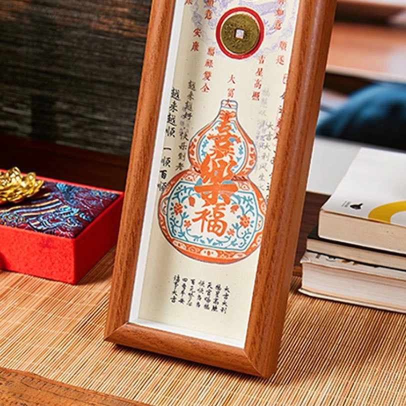 Fu gourd photo frame orange-red style displayed on desktop with books and gift box