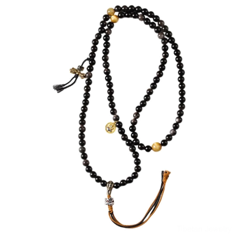 Complete Garuda obsidian protection necklace product shot showing pendant detail and weaving quality
