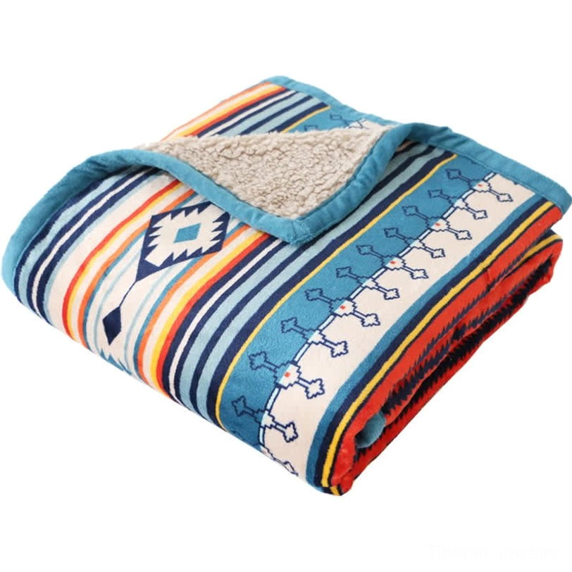 Lifestyle image of geometric throw blanket used for self-care ritual, yoga practice, and wellness routine in comfortable home setting