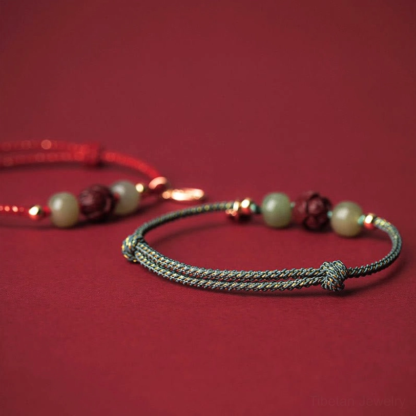 14K gold-plated cinnabar lotus charm on premium braided silk rope lucky bracelet