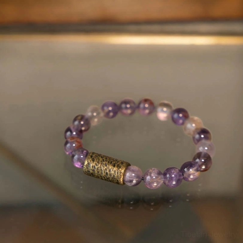 Gold rutilated quartz bracelet available in multiple sizes, flat lay showing size range selection