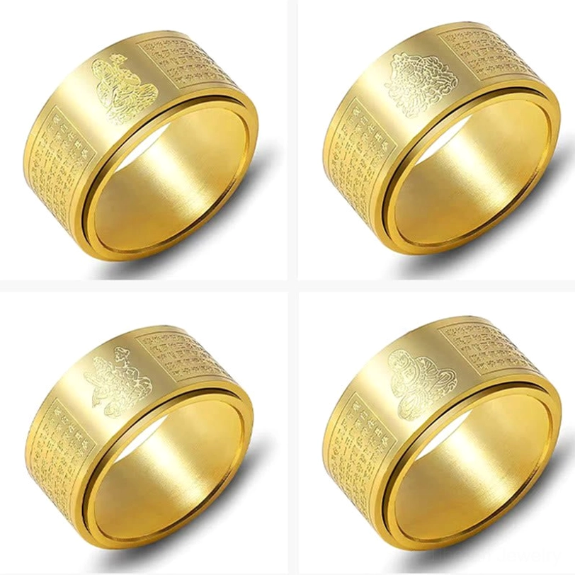 Gold titanium steel spinning Buddha ring with intricate sutra laser engraving showing craftsmanship