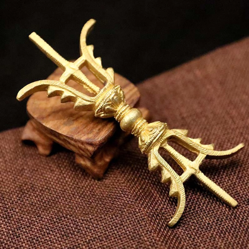 Golden three-prong Tibetan Vajra Dorje 14cm size variant in brass finish, complete ritual meditation tool display