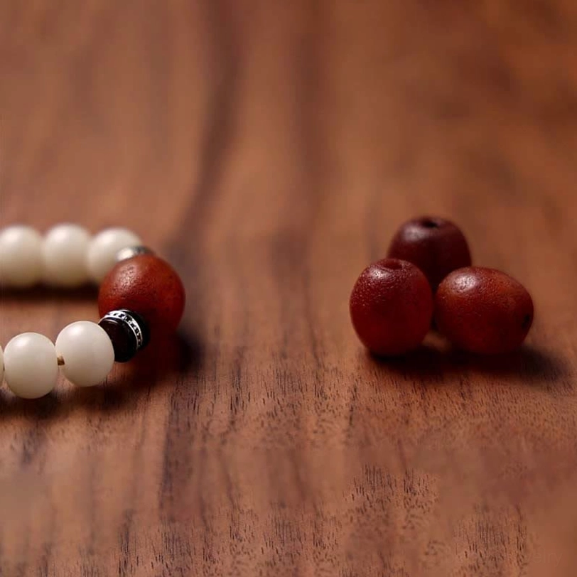 Gray agate and bodhi seed mala bracelet showing stone beads and natural material texture close-up