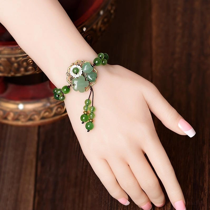Green jade flower bracelet with adjustable braided cord perfect for daily wear and meditation