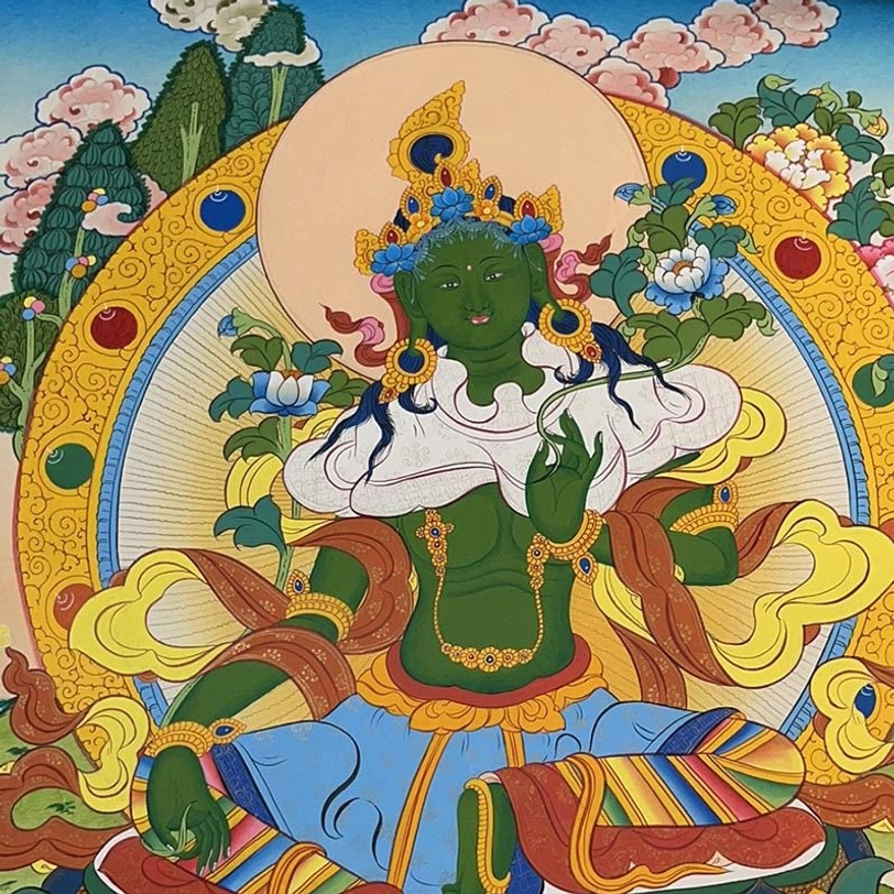 Green Tara thangka - Buddhist deity with elaborate ornaments set in mountain and floral landscape