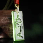 Green Tara Tibetan Liuli crystal pendant necklace with embossed Sanskrit mantra, frosted green glass handcrafted Buddhist protection jewelry