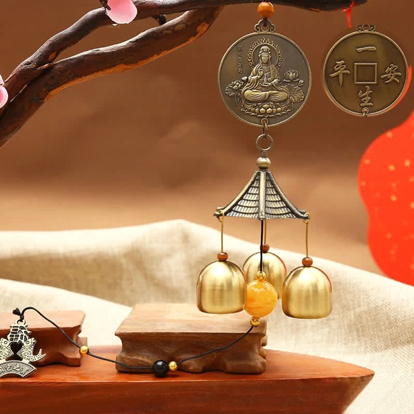 Guanyin Avalokitesvara bodhisattva wind chime with bronze plaque An Ping Yi Sheng coin amber bead three brass bells compassion