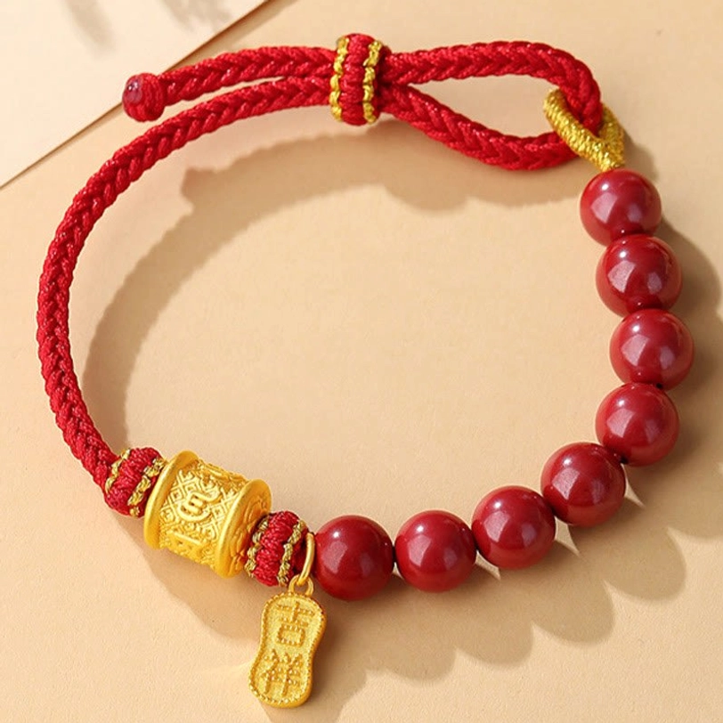 Handmade cinnabar red string bracelet showing natural bead variations and authentic craftsmanship details