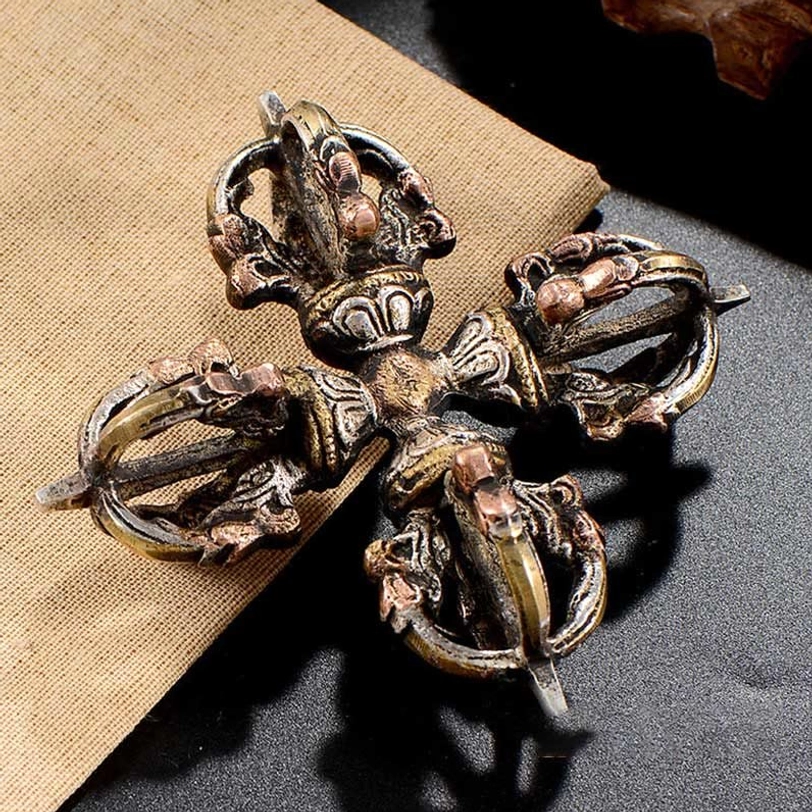 Handcrafted double dorje vajra representing ancient Buddhist spirituality and Tibetan ritual object craftsmanship