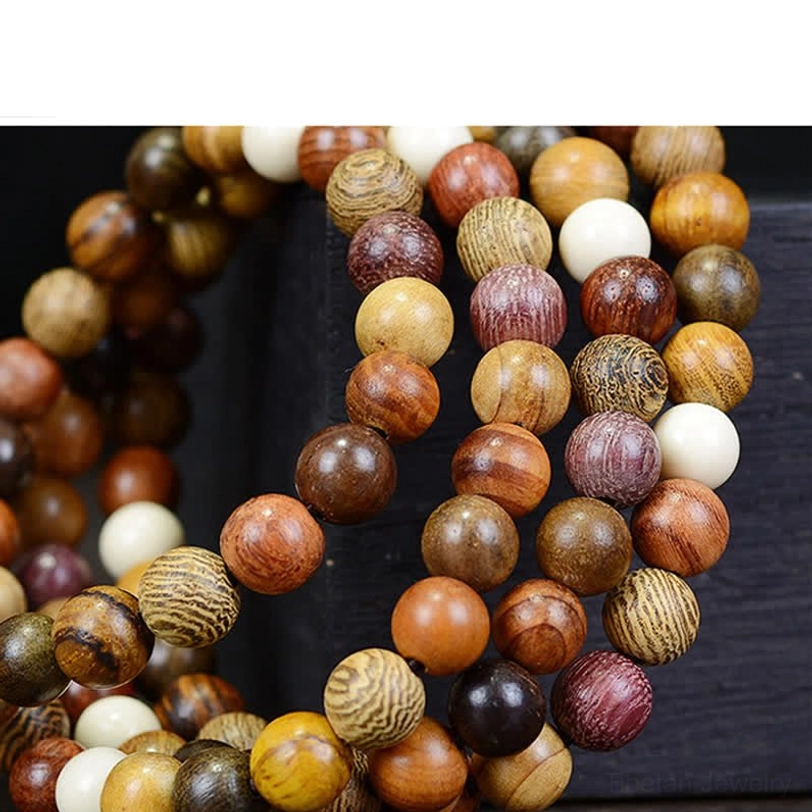 Handcrafted natural wood mala beads strand featuring multi-tone wooden prayer beads with silver charm details