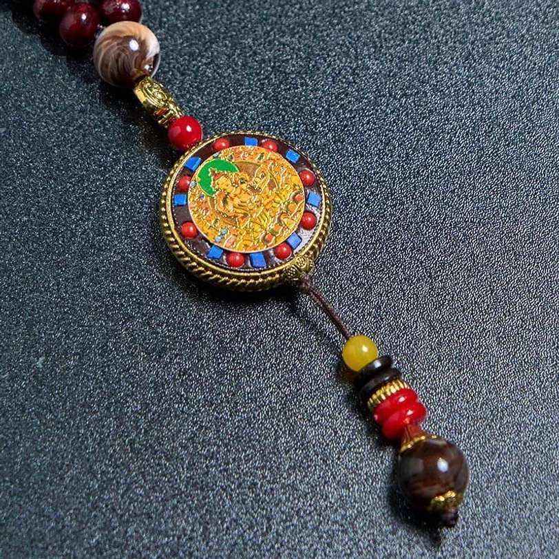 Handcrafted Tibetan Om Mani Padme Hum necklace showing artisan quality and spiritual significance
