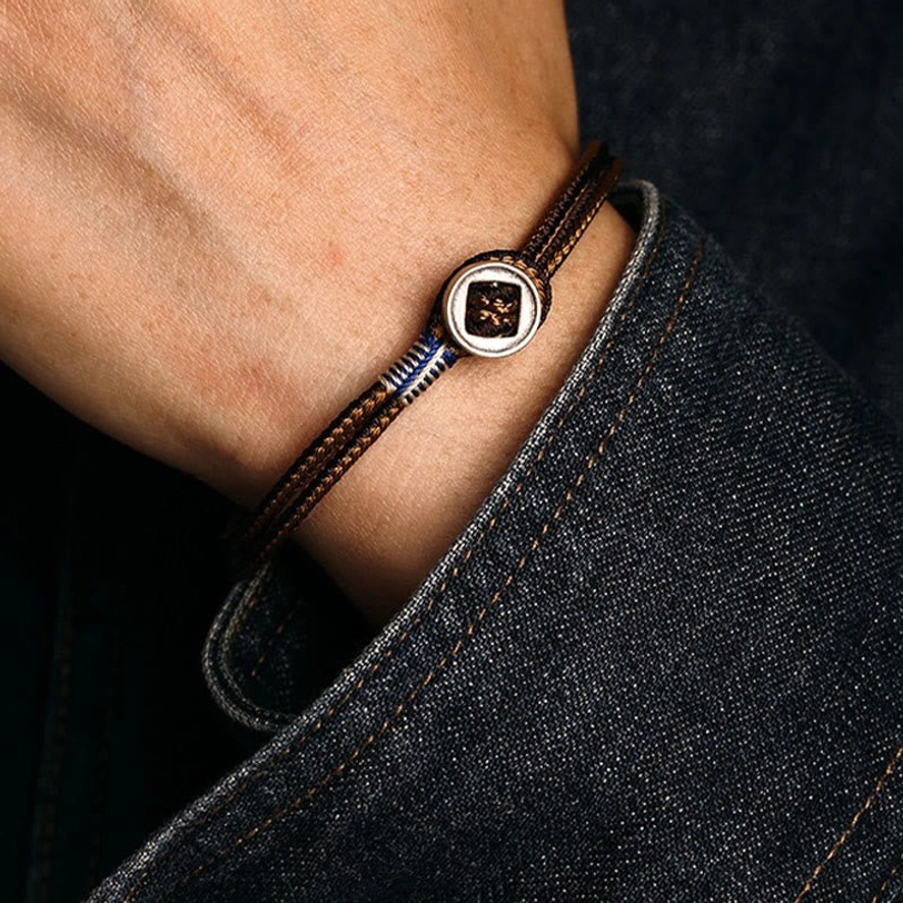 Handcrafted tibetan protection bracelet with 925 sterling silver, woven cord spiritual guardian