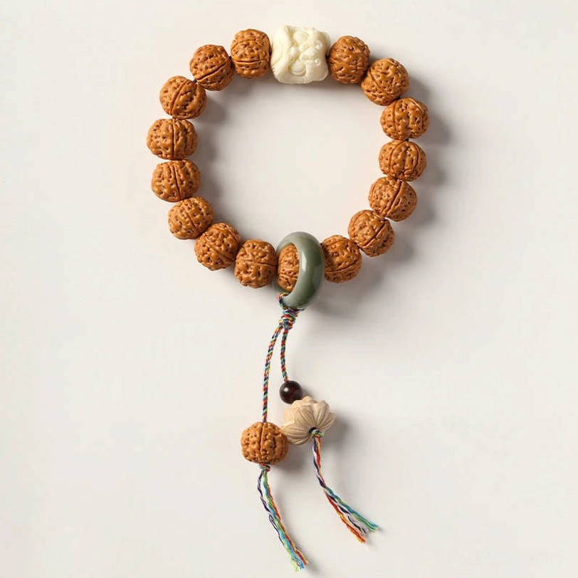 Handmade Bodhi seed mala with three-eye Dzi bead and traditional Tibetan spiritual accessories