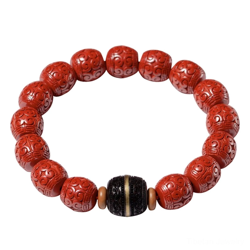 Handmade cinnabar and ebony wood bracelet showing traditional Tibetan craftsmanship, sacred blessing beads with natural color variations