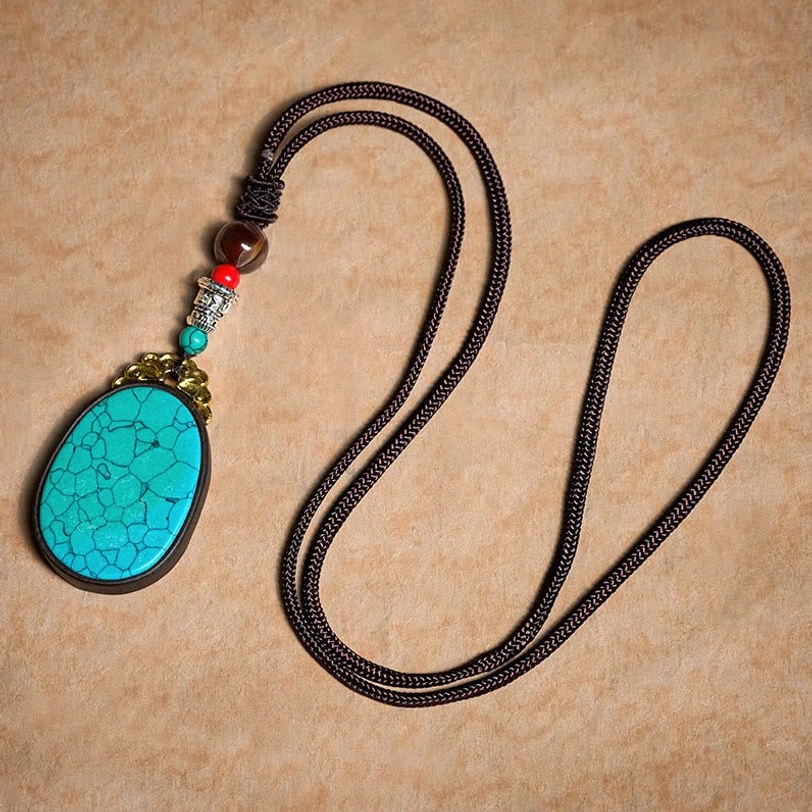 Handmade ebony wood Tibetan necklace showing artisan craftsmanship and authentic materials