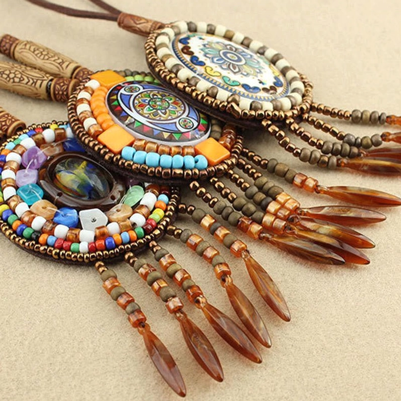 Handmade mandala beaded pendant necklace featuring intricate acrylic resin design and leather cord