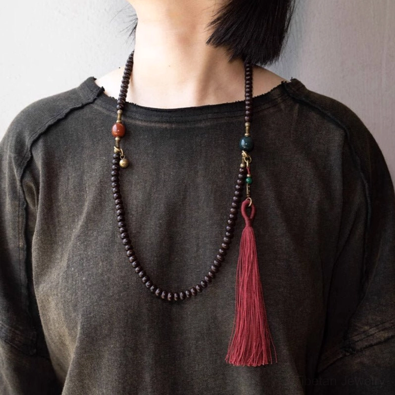 Handmade tibetan mala bracelet with purple bodhi seeds and vintage copper accents