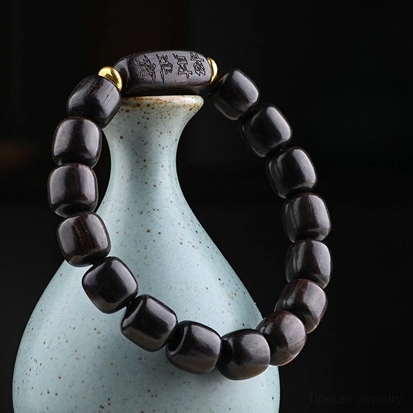 Handmade ebony wood bead bracelet with brass accents Tibetan craft artisan tradition
