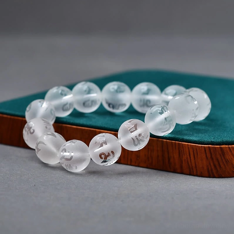 Handmade Tibetan meditation bracelet with natural gemstone beads and traditional mantra engraving