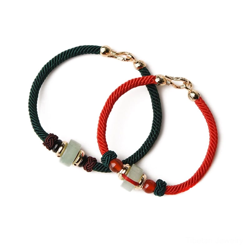 Handmade Tibetan luck braid bracelet authentic craftsmanship displaying natural stone variations and cultural significance