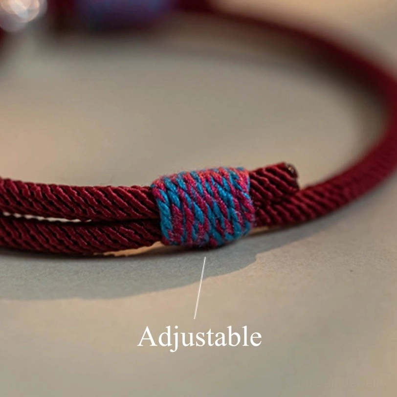 Handmade tibetan om mani padme hum bracelet showing artisanal craftsmanship and natural color variations