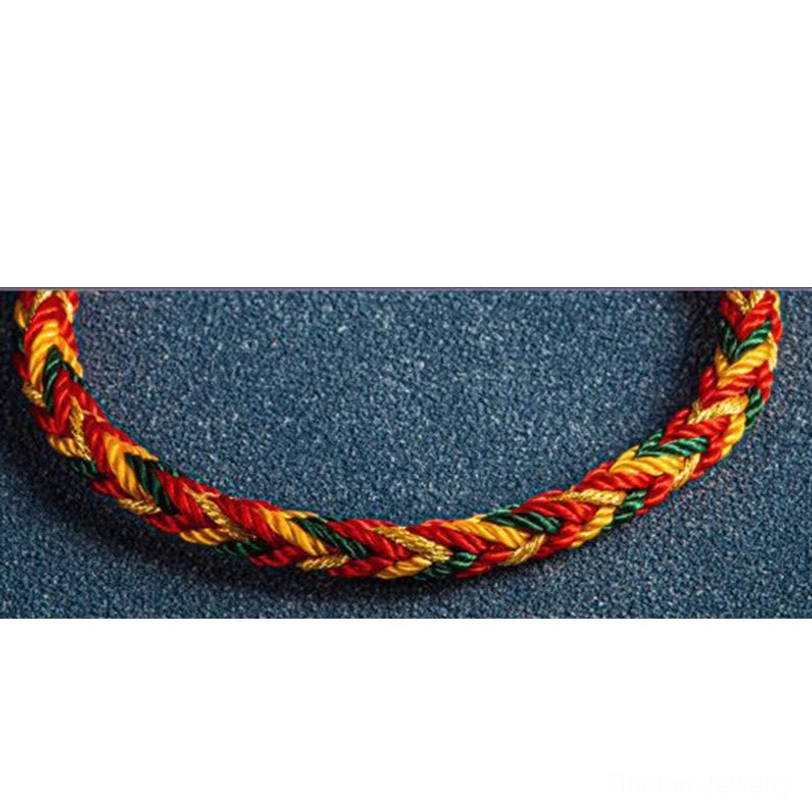 Tibetan protection bracelet handmade with natural threads showing Buddhist spiritual craftsmanship