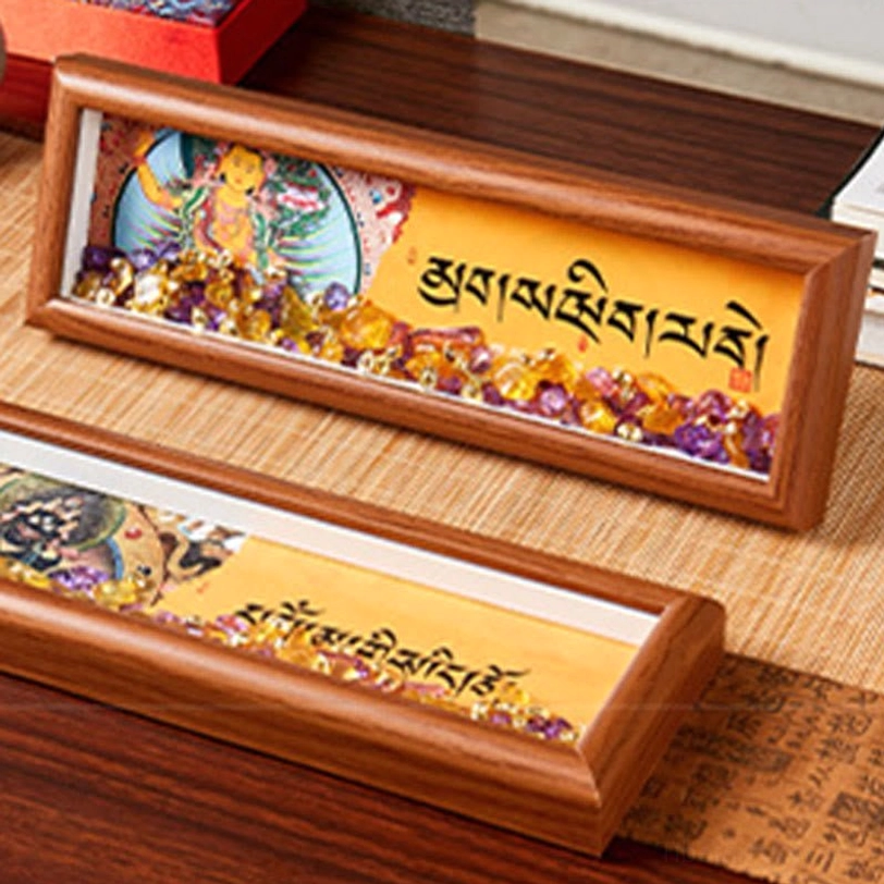 Handcrafted thangka frame detail showing artisan craftsmanship, natural crystal inlays and wooden frame construction