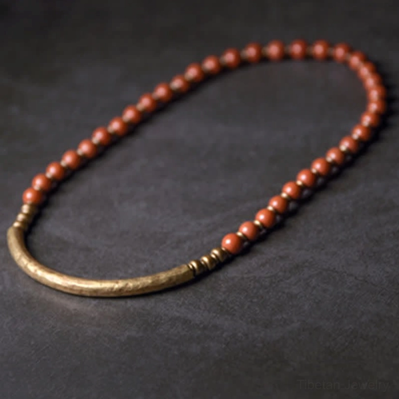 Long red bead strand with open hammered copper cuff couple bracelet set