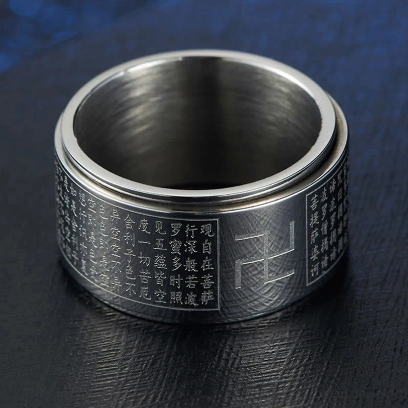 Heart Sutra Swastika Rotatable Ring studio shot with professional lighting highlighting titanium steel craftsmanship