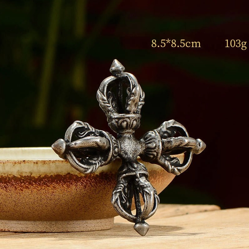 Iron dorje vajra handcrafted in traditional Tibetan style representing spiritual power and enlightenment