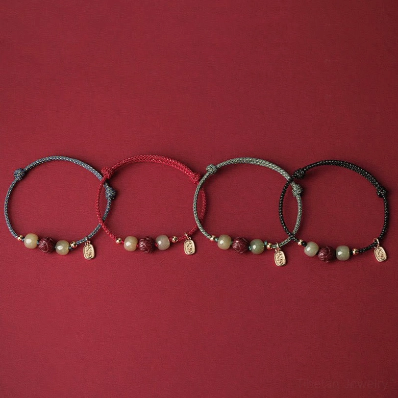 Hetian jade and cinnabar lotus bracelet as meaningful gift for prosperity and protection