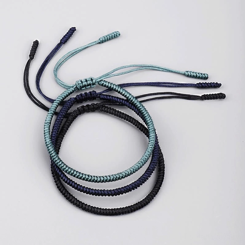 Navy blue King Kong knot handcrafted bracelet featuring braided cord with adjustable rope ends