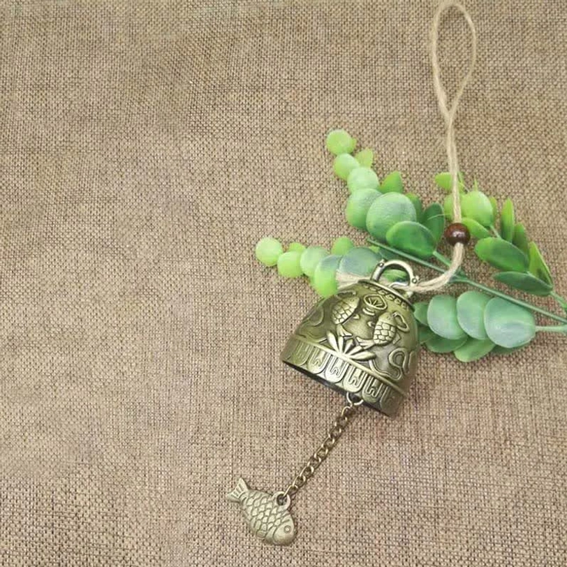 Koi fish themed Tibetan wind chime with embossed fish pattern, charm pendant and natural hemp rope hanger