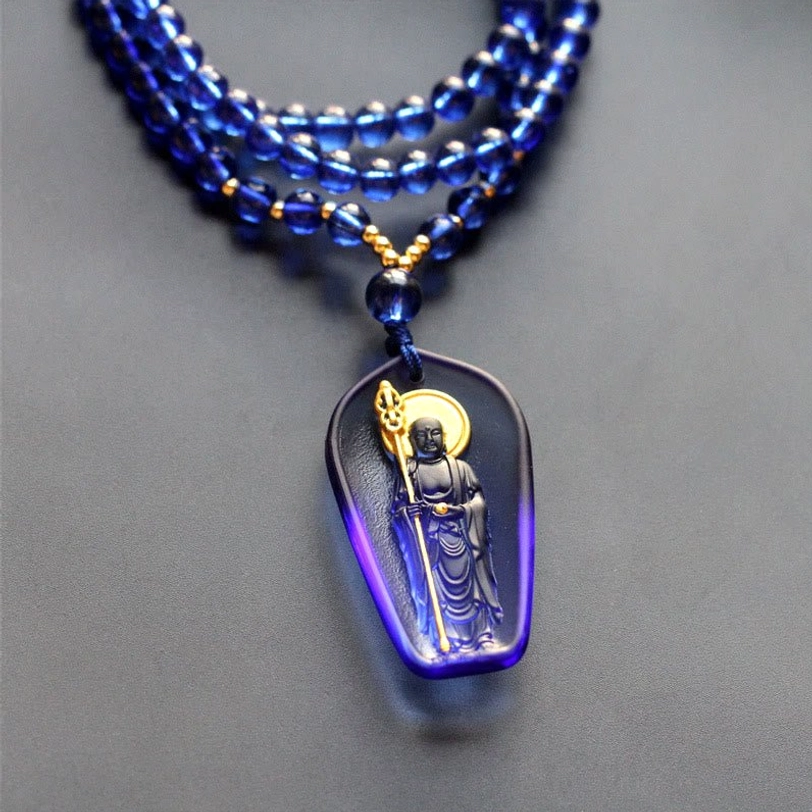 Ksitigarbha Bodhisattva Liuli crystal pendant necklace with gradient blue glass and golden halo monk staff detail
