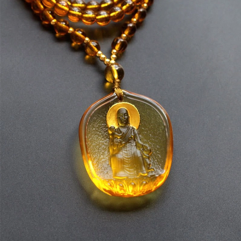 Yellow amber Liuli crystal Ksitigarbha with child pendant seated Buddha golden halo brown beaded chain